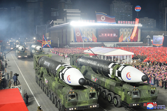 A photo released by the Korean Central News Agency (KCNA) shows a procession of Hwasong-17 intercontinental ballistic missiles (ICBM) at a military parade marking the 75th anniversary of the founding of the Korean People's Army in Kim Il Sung Square in downtown Pyongyang on Wednesday evening. [YONHAP]