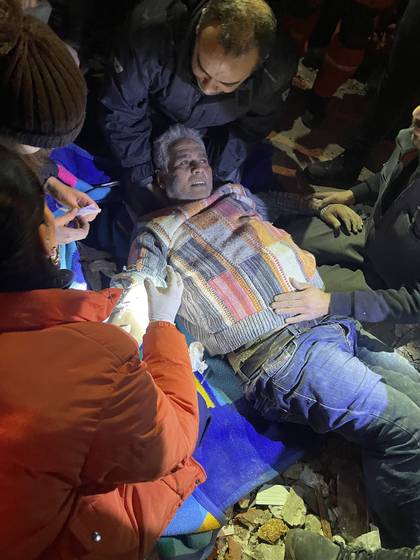 The Korea Disaster Relief Team (KDRT) rescues a man in his 70s from rubbles in Hatay, Turkey Thursday. [FOREIGN MINISTRY]