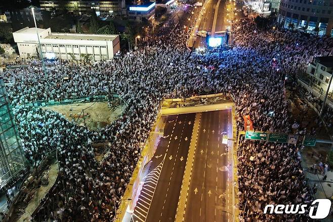 11일(현지시간) 이스라엘 텔아비브에서 정부의 사법개혁안에 반대하는 시위가 벌어졌다. 23.03.11 ⓒ AFP=뉴스1 ⓒ News1 김예슬 기자