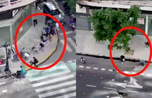 거리에 떨어진 돈을 줍고 있는 시민들. 사진=아르헨티나 매체 C5N  보도 장면