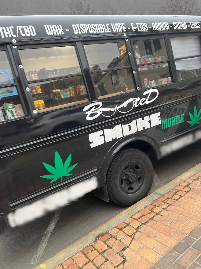A van with green marijuana leaves on it from Rhode Island. People aged 21 and over can purchase small amounts of cannabis in the state, one of 21 US states where recreational use is legal. (Photo provided by a source)