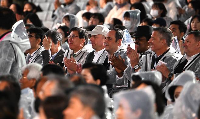 Delegates from the Bureau International des Expositions and Busan Mayor Park Heong-joon (fifth from right), attend the "K-Culture Night" concert at the Busan Cinema Center on Wednesday. (Im Se-jun/The Korea Herald)