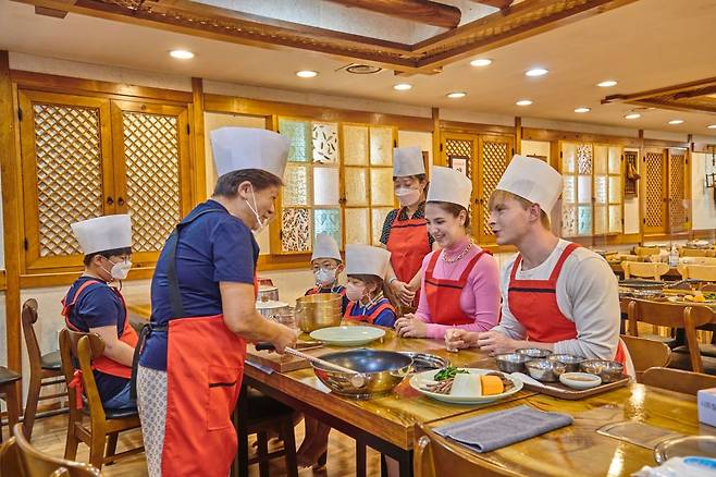 Visitors learn about Korean food during World Bibim Week at Jeonju Hanok Village in Jeonju, North Jeolla Province. (World Bibim Week)