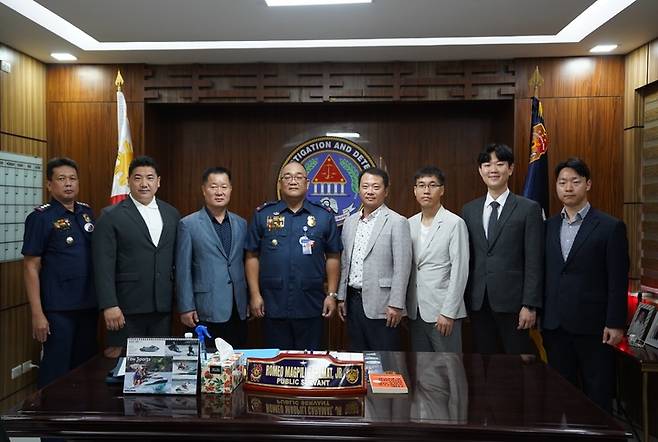 [서울=뉴시스]한국 경찰청 대표단과 필리핀 경찰청(범죄수사정보과) 단체 사진.(사진=경찰청 제공) *재판매 및 DB 금지