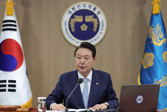 President Yoon Suk Yeol presides over a Cabinet meeting at the Yongsan presidential office in central Seoul on Tuesday. [JOINT PRESS CORPS]