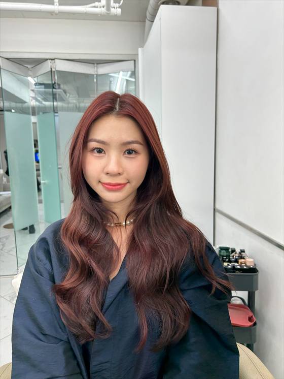 Miki Tew after her hair and makeup was done, based on a look by Sullyoon of Nmixx [SHIN MIN-HEE]