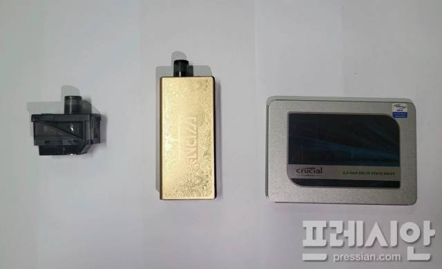 ▲피의자들이 합성대마를 유통하는데 사용한 액상 카트리지와 전자담배 액상통 및 경찰의 수사 시작 후 은닉을 시도한 하드디스크. ⓒ용인동부경찰서