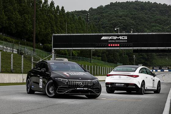 Mercedes-AMG EQE, left, and EQS on track [MERCEDES-BENZ KOREA]
