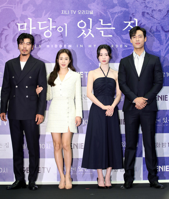 Actor Lim Ji-yeon, second from right, poses for photos during a press conference for Genie TV original drama series “Lies Hidden in My Garden” along with her co-stars on June 19 at the Stanford Hotel Korea in western Seoul, as her first work since "The Glory." [NEWS1]