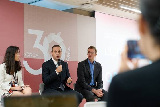 From left: So Ji-hye, corporate affairs and engagement director at L’Oréal Korea; Fabrice Megarbane, the North Asia President at L’Oréal Group; and Samuel du Retail, the President of L’Oréal Korea at a press conference last Friday at L’Oréal Korea headquarters in southern Seoul. [L'OREAL]