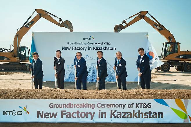 cap - KT&G CEO Baek Bok-in (fourth from left) joins a ground breaking ceremony for the company's new tobacco manufacturing plant in Almaty, Kazakhstan, Wednesday. (KT&G)