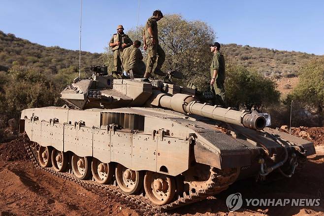 레바논 국경지대에 배치된 이스라엘 탱크 [AFP 연합뉴스 자료사진. 재판매 및 DB 금지]