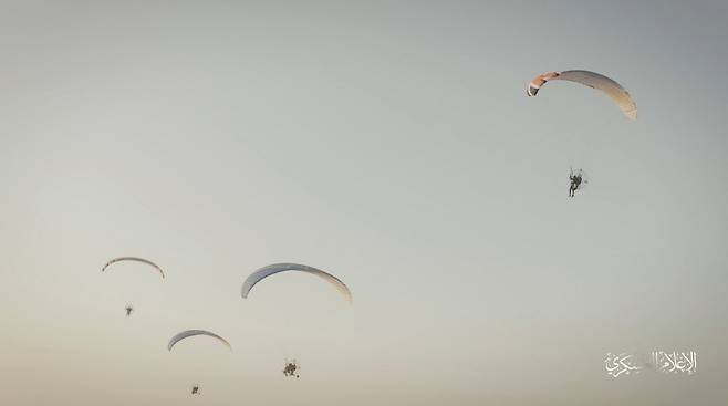 Hamas' armed wing IIzz el-Deen al-Qassam Brigades train with paragliders as they prepare for an armed air assault, in this screengrab obtained from a social media video released by Izz el-Deen al-Qassam Brigades on October 7. (Reuters)