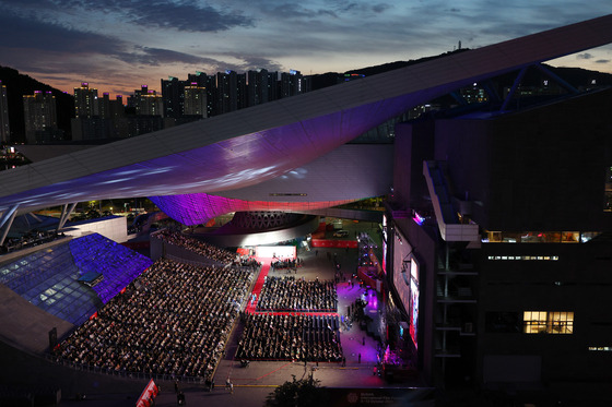 Film industry insiders including actors and directors attend the opening ceremony of the 28th Busan International Film Festival, held at the Busan Cinema Center in Haeundae District, eastern Busan, on Wednesday. [YONHAP]