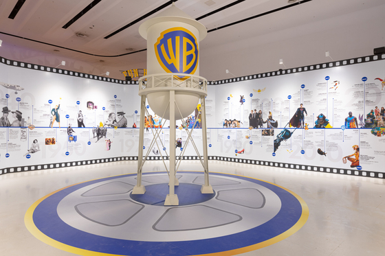 A timeline of some of Warner Bros. Entertainment's most famous films and characters is on display at the ″Celebrating Every Story″ exhibition at the Dongdaemun Design Plaza in Dongdaemun District, central Seoul, on Nov. 17, a day before the official opening of the exhibition. [WARNER BROS. ENTERTAINMENT]