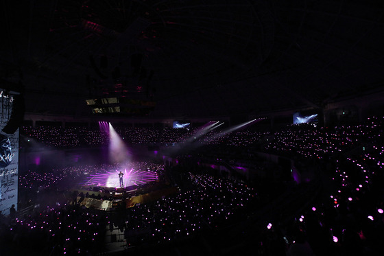 BTS' Jungkook performs at his showcase, ″Golden,″ on Monday at Jangchung Arena in Jung District, central Seoul [BIGHIT MUSIC]