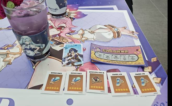 '도라의 복권' 5등 경품 성유물 스티커.