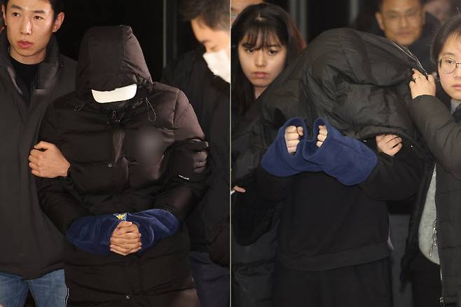 경복궁 담장을 스프레이로 낙서해 훼손하고 도주했던 남녀 피의자들이 경찰에 체포돼 19일 서울 종로구 종로경찰서에 들어오고 있다 (사진=연합뉴스)