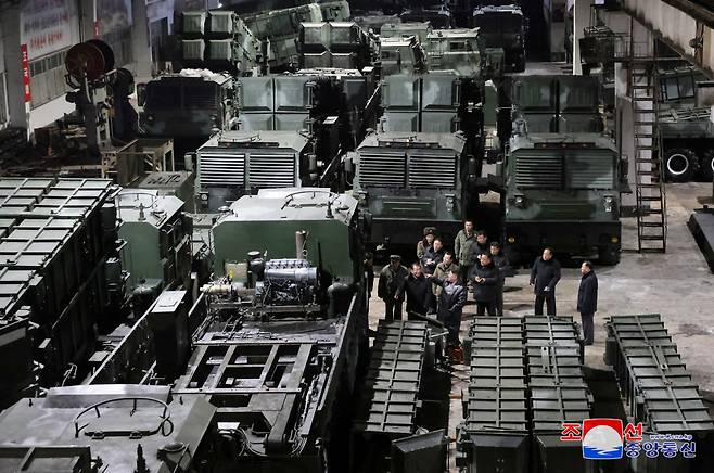 North Korean leader Kim Jong-un inspects a munitions factory, in this undated photo released by the North's official Korean Central News Agency on Wednesday. During his visits to major munitions factories in unspecified locations on Monday and Tuesday, Kim called South Korea the country's "principal enemy" and said he has "no intention of avoiding war," according to the KCNA report. (Yonhap)