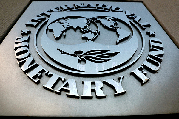 The International Monetary Fund (IMF) logo is seen outside the headquarters building in Washington, U.S. [Photo by Reuters]