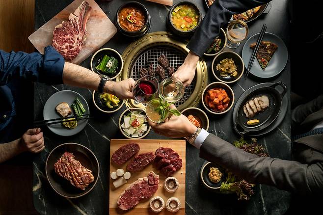 A promotional photo for K-food shows the Cote Korean Steakhouse, which has locations in the US and Singapore. (Agriculture Ministry)