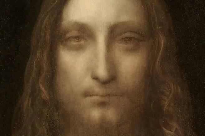 레오나르도 다빈치가 그린 것으로 추정되는 그림 살바토르 문디. 눈과 입술의 표현력이 탁월하다. 그림을 그릴 당시 50~60대였던 다빈치는 광학 연구에 매몰돼 있었다.(부분확대) [크리스티]