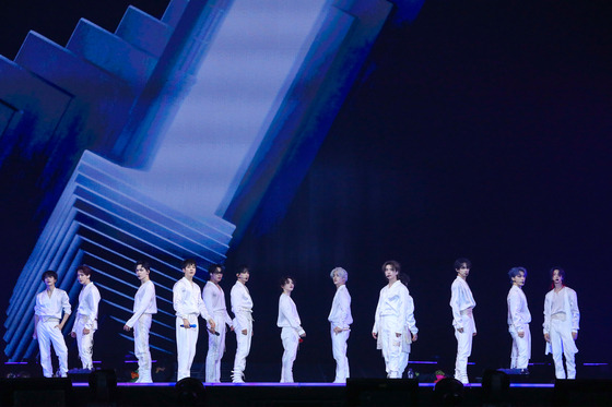 Boy band Seventeen performs during its concert last July in Gocheok Sky Dome in western Seoul. [PLEDIS ENTERTAINMENT]