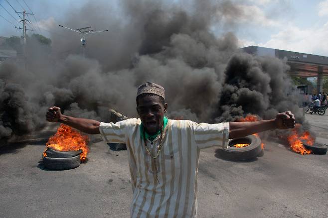 12일(현지시간) 아이티 포르토프랭스에서 열린 시위 장면.(사진=AFP)