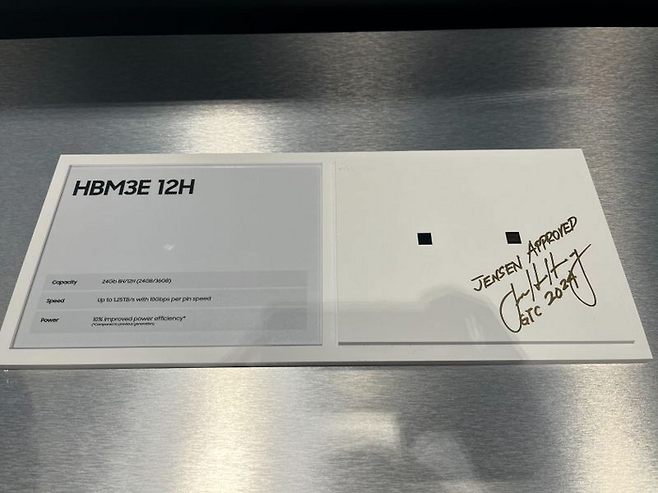 Nvidia CEO Jensen Huang signs ‘Jensen Approved’ on Samsung‘s HBM3E during his visit to the Samsung booth at GTC 2024 in San Jose, California, U.S., on Mar. 20, 2024. [Captured from the LinkedIn of Han Jin-man, head of Samsung Electronics’ U.S. division]