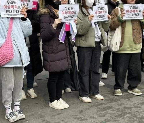 Members of a women's advocacy organization protest a planned adult festival in Suwon, Gyeonggi, on March 12. [SUWON WOMEN'S HOTLINE]