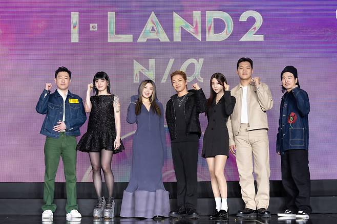 From left: Producer Kim Shin-young, Monika, Lee Jung, Taeyang, VVN, 24 and Producer Lee Chang-gyu pose for photos during the "I-Land2: N/a" press conference held at S Factory Seongsu, Seoul, on Friday. (CJ ENM)