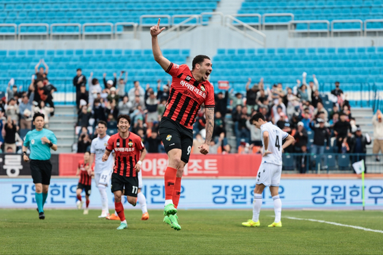Gangwon FC forward Yago Cariello, center, celebrates scoring a goal during a K League 1 match against Incheon United at Chuncheon Songam Sports Town in Chuncheon, Gangwon on Sunday. [GANGWON FC]