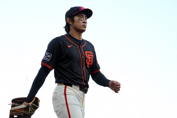 BASEBALL-MLB-SF-PIT/ - Apr 27, 2024; San Francisco, California, USA; San Francisco Giants outfielder Jung Hoo Lee (51) walks to the dugout before the game against the Pittsburgh Pirates at Oracle Park. Mandatory Credit: Darren Yamashita-USA TODAY Sports