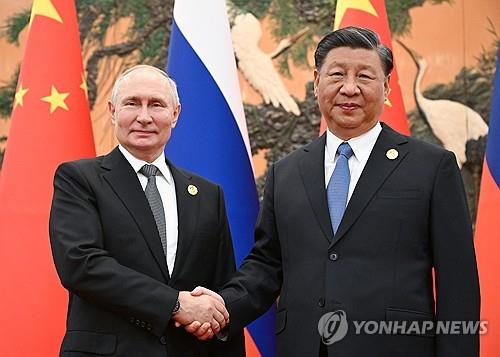 작년 10월 베이징서 만난 시진핑과 푸틴 [타스 연합뉴스 자료사진]