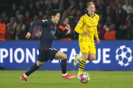 PSG's Lee Kang-in in action during the Champions League semifinal second leg match between Paris Saint-Germain and Borussia Dortmund at Parc des Princes in Paris on Tuesday. [AP/YONHAP]