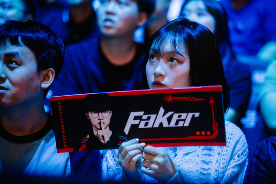 A T1 fans looks dejected during the match against G2 on Friday at the Mid-Season Invitational in Chengdu, China. [RIOT GAMES]