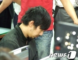 2012년 9월 13일, 도주 55일만에 체포된 김홍일. ⓒ 뉴스1
