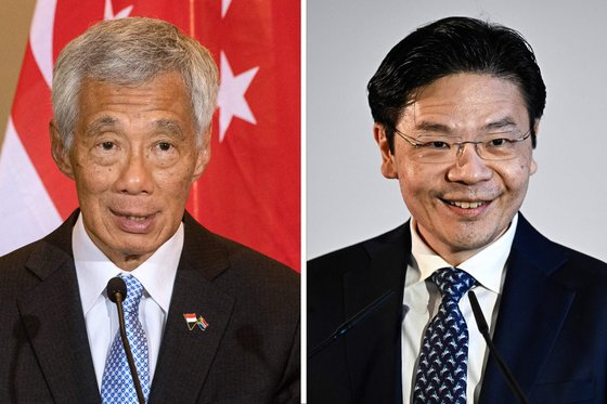 지난 20년간 싱가포르를 이끈 리셴룽 총리와 신임 로런스 웡 총리. /AFPBBNews=뉴스1