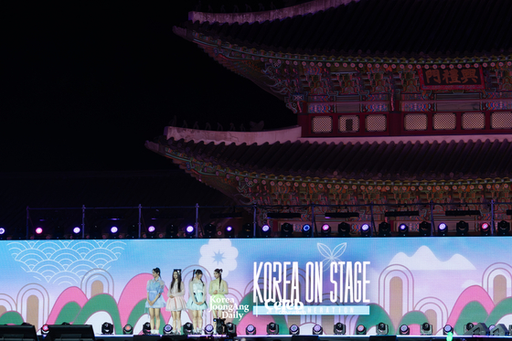 NewJeans on stage at the “2024 Korea On Stage — New Generation″ event held at the Gyeongbok Palace's Geunjeongjeon on Tuesday. [DANIELA GONZALEZ PEREZ]