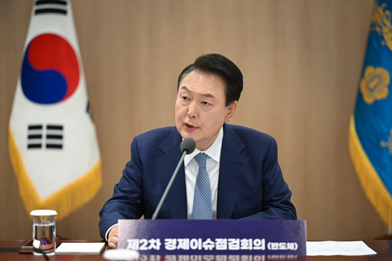 Korean President Yoon Suk Yeol speaks during a meeting reviewing economic issues at a presidential office in Yongsan, central Seoul, on Thursday. [PRESIDENTIAL OFFICE]