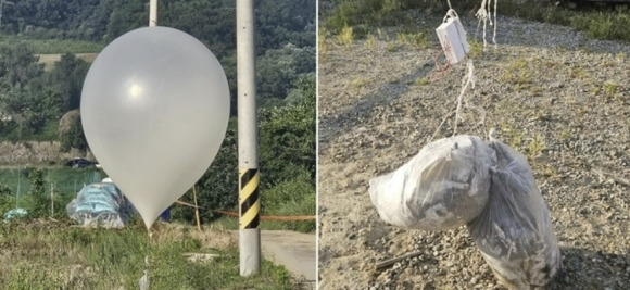 북한이 전단을 담아 날린 것으로 추정되는 풍선이 접경지역뿐 아니라 광명, 광주, 성남, 김포, 용인, 평택, 화성시 등 경기 중남부 지역에서도 잇따라 발견돼 군 당국이  수거했다. 사진은 전단이 담긴 풍선.  연합뉴스