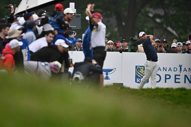 HAMILTON, ONTARIO - JUNE 02: Tom Kim of South Korea plays his shot from the ninth tee as a gallery of fans look on during the final round of the RBC Canadian Open at Hamilton Golf & Country Club on June 02, 2024 in Hamilton, Ontario, Canada.   Minas Panagiotakis/Getty Images/AFP (Photo by Minas Panagiotakis / GETTY IMAGES NORTH AMERICA / Getty Images via AFP)







<저작권자(c) 연합뉴스, 무단 전재-재배포, AI 학습 및 활용 금지>