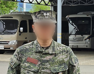 The commander of the 11th Artillery Battalion, 1st Marine Division, 1st Marine Division, heads to the Gyeongbuk Police Department‘s criminal riot squad headquarters in Gyeongsan, North Gyeongsang Province, for an interrogation during the day on March 19, 2019. Yonhap News Agency