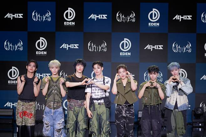 From left: All(H)ours' Masami, Minje, Xayden, Kunho, Youmin, On:n, and Hyunbin pose for a photo during a press conference in Gangnam, southern Seoul, Tuesday. (Eden Entertainment)