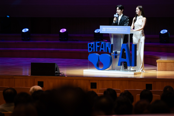 Actors Jang Dong-yoon, left, and Jung Soo-jung host the opening ceremony of the 28th Bucheon International Fantastic Film Festival. [BIFAN]