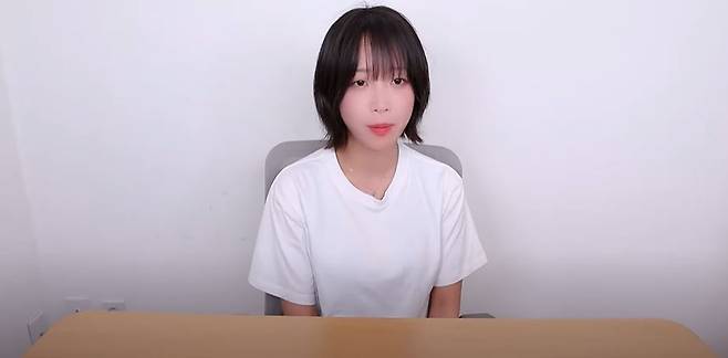 This screengrab shows YouTuber Tzuyang, in a video she posted Thursday detailing her assault and exploitation. (Yonhap)