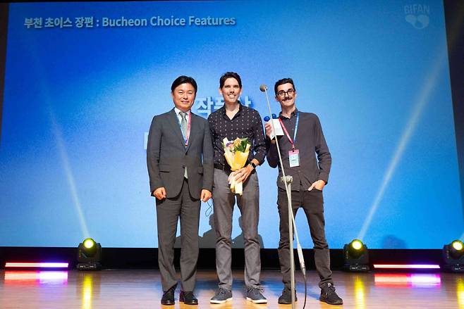 (From left) Bucheon City Mayor and BIFAN Festival Organizing Committee Chair Cho Yong-eek, director Francis Galluppi and producer Matt O'Neill pose for a photo during an award ceremony held at Bucheon City Hall on Friday. (BIFAN)