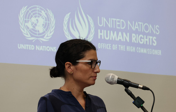 Eleonor Fernandez, human rights officer at the UN Human Rights Office in Seoul, introduces the office's new report on forced labor in North Korea, at the Press Center in central Seoul on Tuesday. The report was based on 183 interviews conducted between June 2015 and May 2023 with North Korean defectors who have settled in South Korea. [YONHAP]