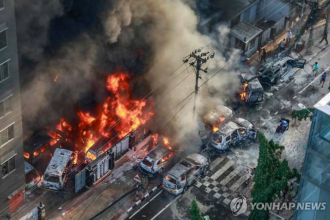 지난 18일 다카의 한 시위 현장  [AFP 연합뉴스 자료사진. 재판매 및 DB 금지]