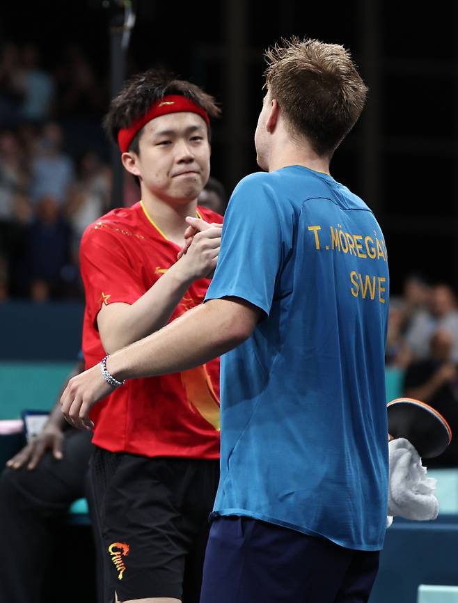 왕추친과 뫼레고르. 신화=연합뉴스